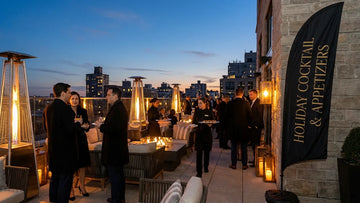 Atmospheric evening shot of upscale cocktail lounge patio with Holiday Cocktail Reception and Appetizers feather flag