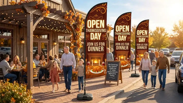 Vibrant storefront on Thanksgiving afternoon with Open Thanksgiving Day Join Us For Dinner feather flag fluttering