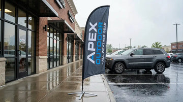 Premium hydrophobic double-sided banner near a storefront during rain