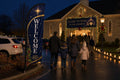 Christmas Advent church feather flag at parking lot entrance guiding first-time visitors
