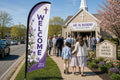 Church feather flag Easter / Spring placed roadside 500ft before entrance visible to Sunday traffic