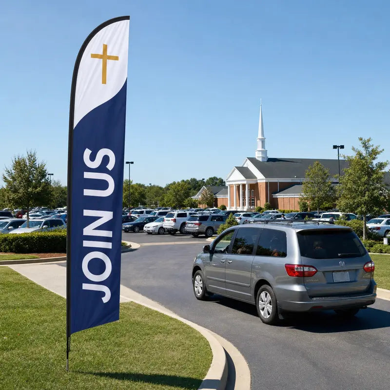 church join us feather flag at parking lot entrance guiding first-time visitors on Sunday morning
