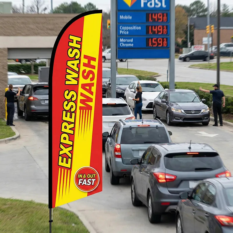 High-visibility red and yellow express wash feather flag showing high-speed commuter traffic turning into a car wash entrance.
