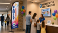 Family Experience church feather flag at a children's ministry check-in area