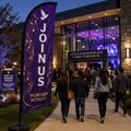 church feather flag with praise and worship Join Us theme outside modern worship night