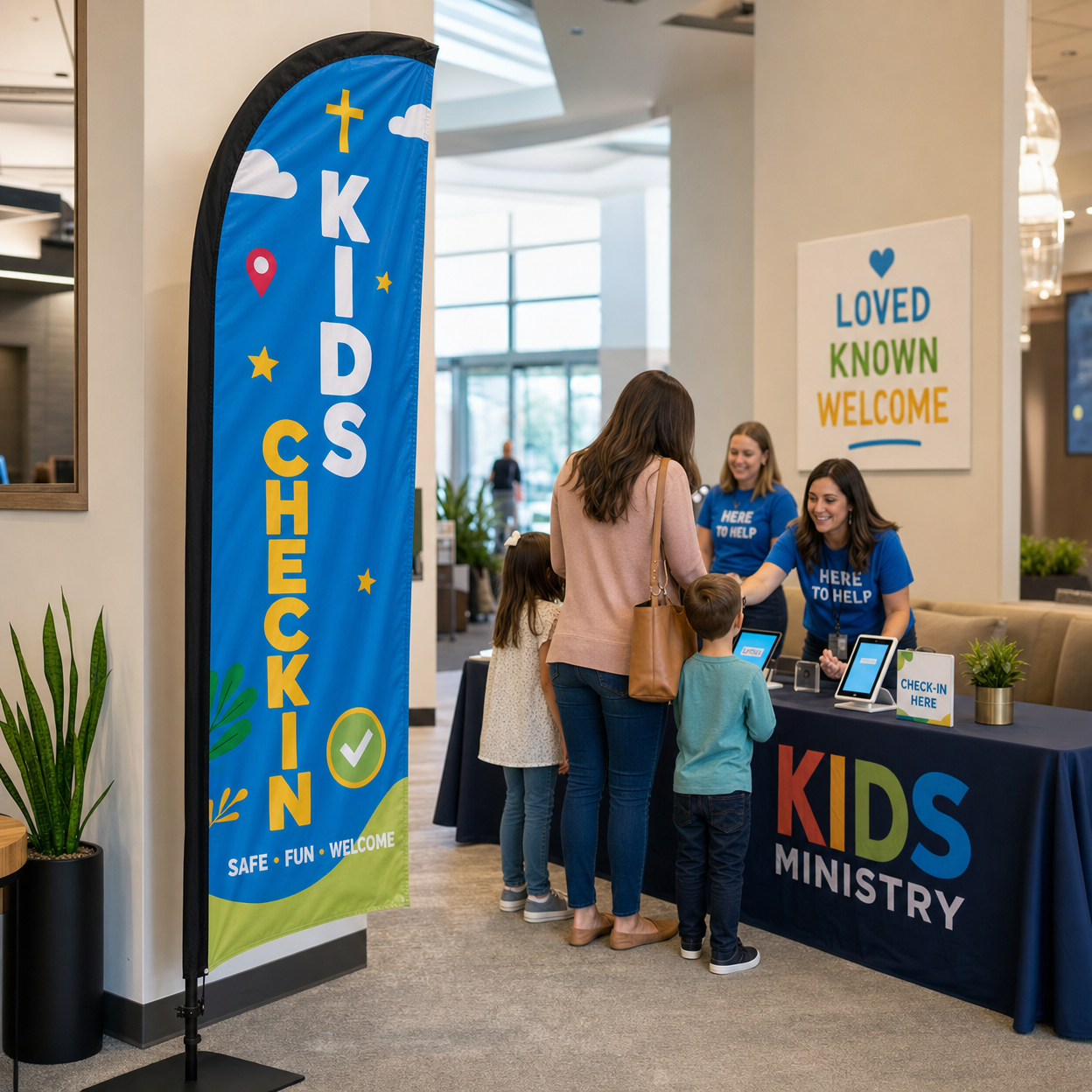 Kids ministry check-in feather flag inside church lobby