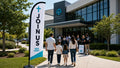 church feather flag with modern campus New Here Join Us theme at church entrance, case study 1