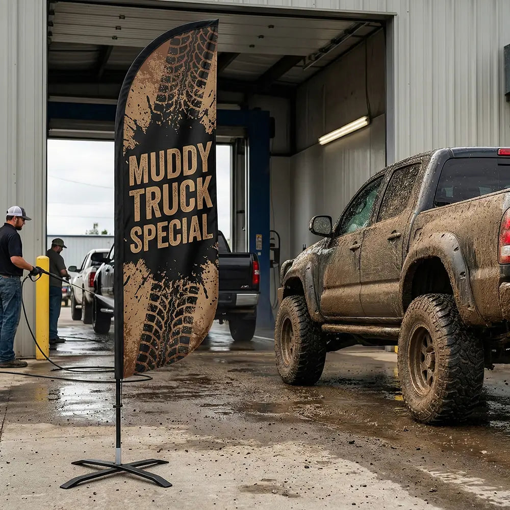 Rugged Muddy Truck Special feather flag with tire tread graphics designed for off-road vehicle enthusiasts.
