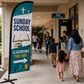 Sunday School Classrooms church feather flag outside a church education wing with families and teachers arriving