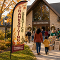 Thanksgiving Service church feather flag on church lawn with community gathering and food drive entrance