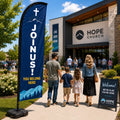 church feather flag with launch Sunday Join Us theme outside new church plant